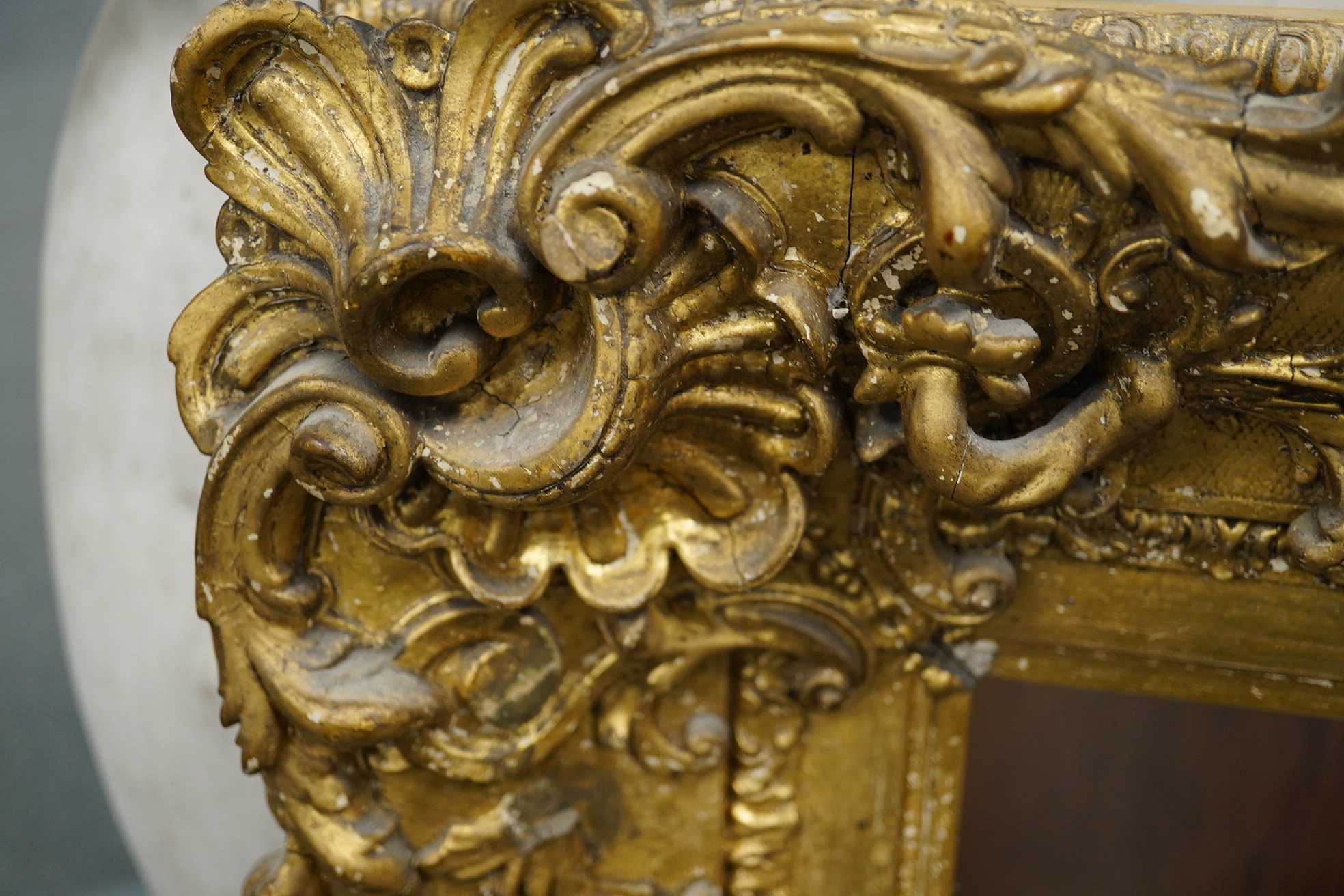 A 19th century ornate gilt picture frame, aperture size 74 x 60cm. Condition - fair, minor losses